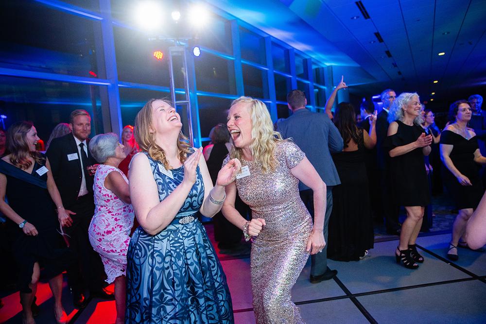 Guests dancing in the Laker Lounge at Enrichment 2018